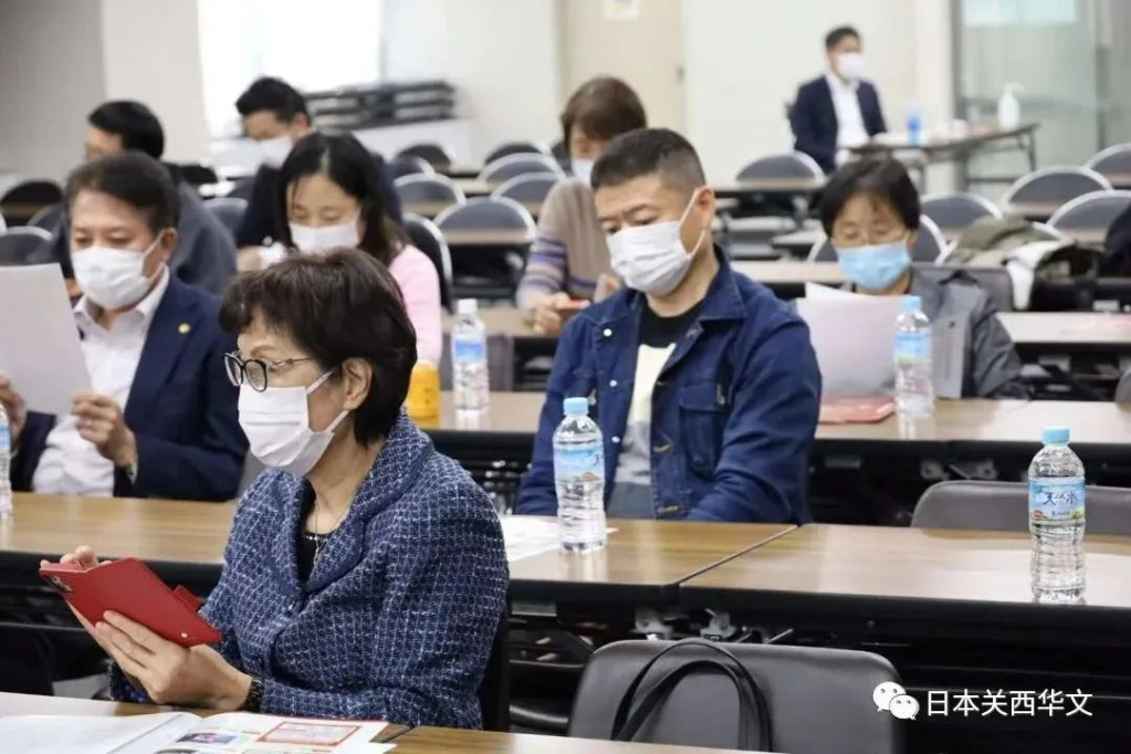 参会代表认真听取汇报